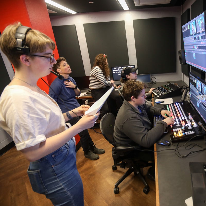 students working in a media studio