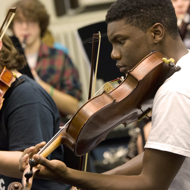 student playing violin