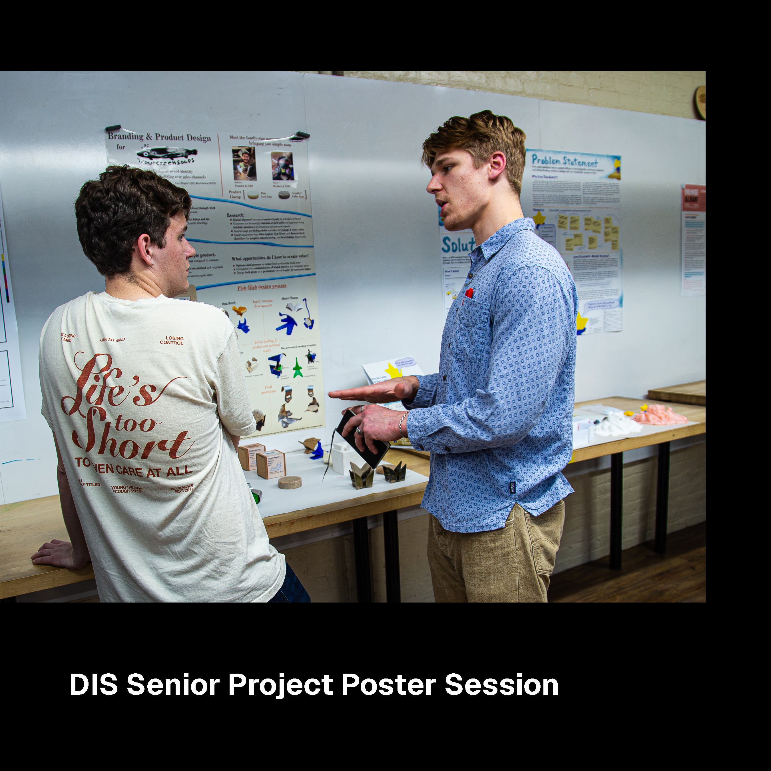 Students chat during the DIS Senior Project Poster Session