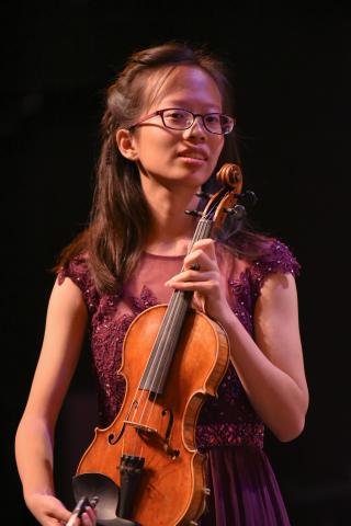 Sarah Shiang holding a violin